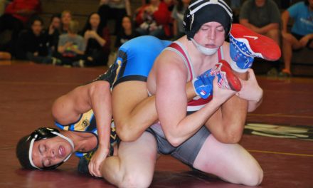 Fort Mill wins classic battle on mat against Rival Bearcats