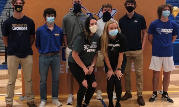 Nine Fort Mill athletes sign to play college sports