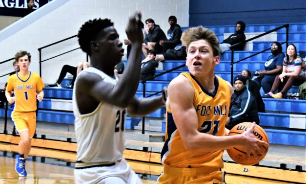 Fort Mill hoops splits games in two different tourneys