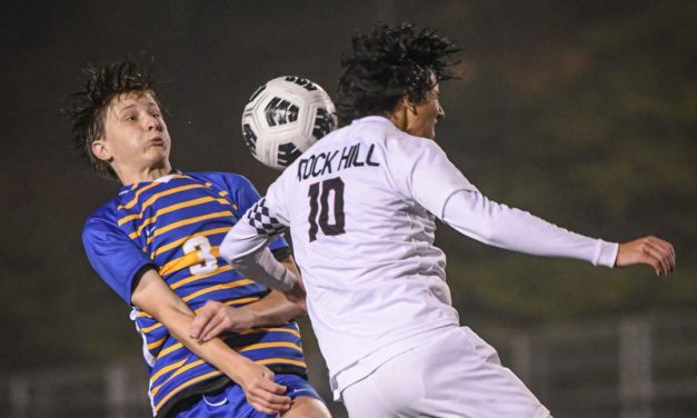 ‘We did it for him’: Inspired by injured teammate, Fort Mill toughs out 3-2 win over Rock Hill 