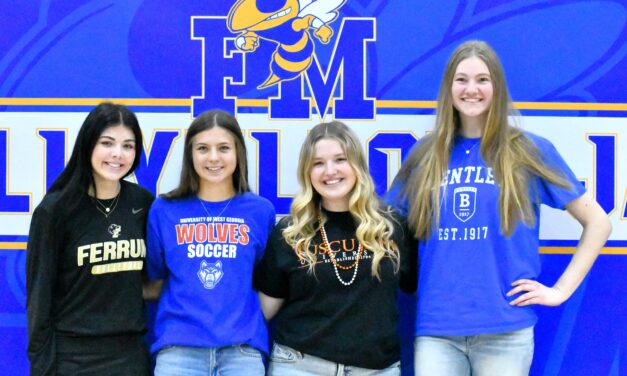Four Fort Mill athletes sign to play in college